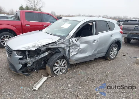 2016 Mazda Cx-5 Touring z USA, uszkodzony, nr VIN JM3KE4CY0G0870934